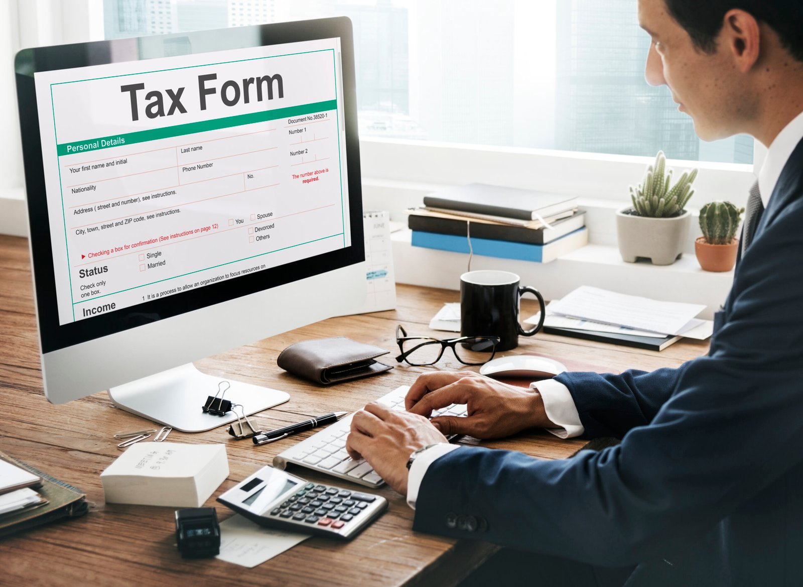 Tax preparation documents with calculator and forms - Tax Preparation Services